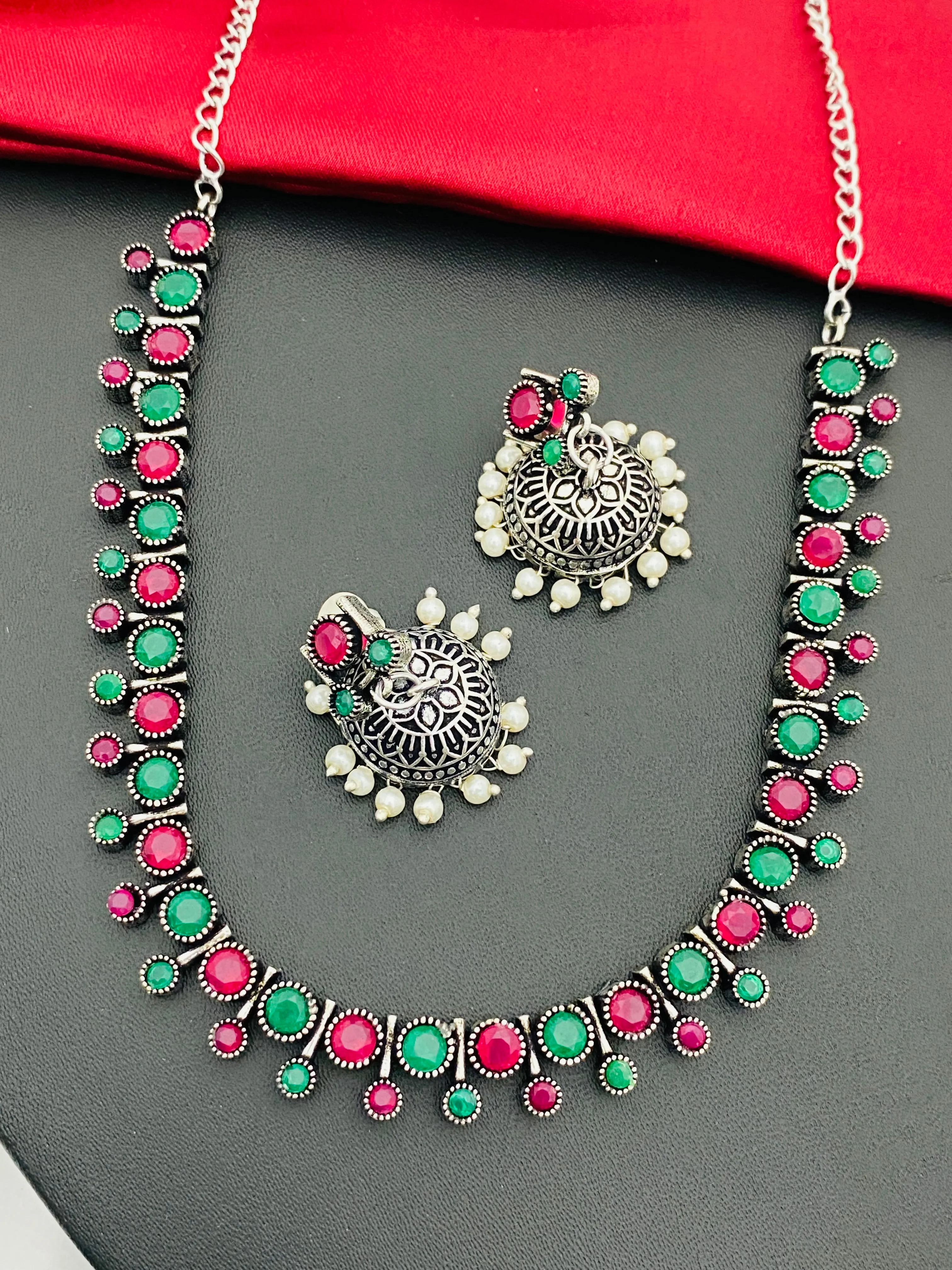 Stunning Emerald And Ruby Stoned German Silver Toned Oxidized Necklace Set With Jhumka Earrings