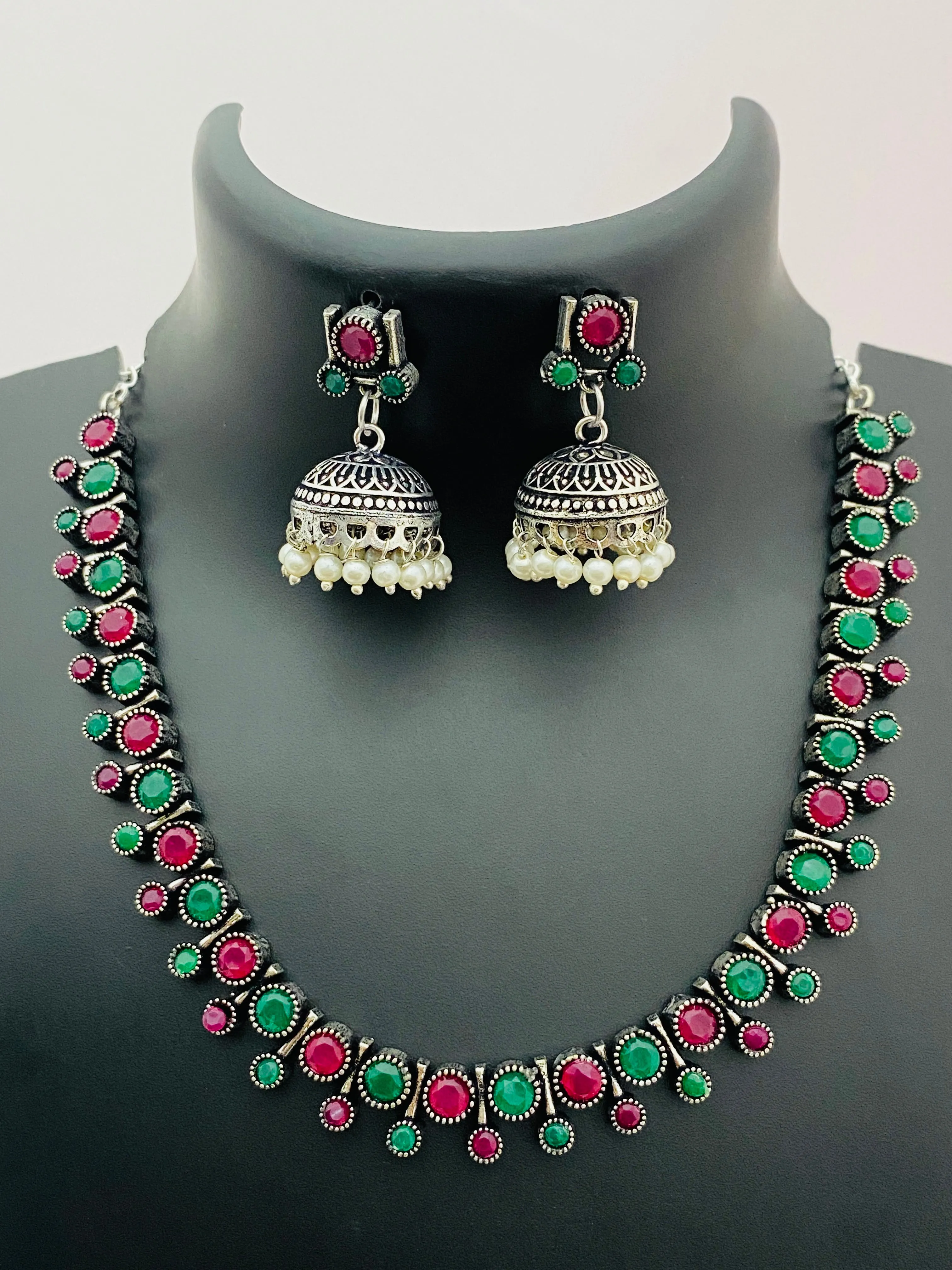 Stunning Emerald And Ruby Stoned German Silver Toned Oxidized Necklace Set With Jhumka Earrings