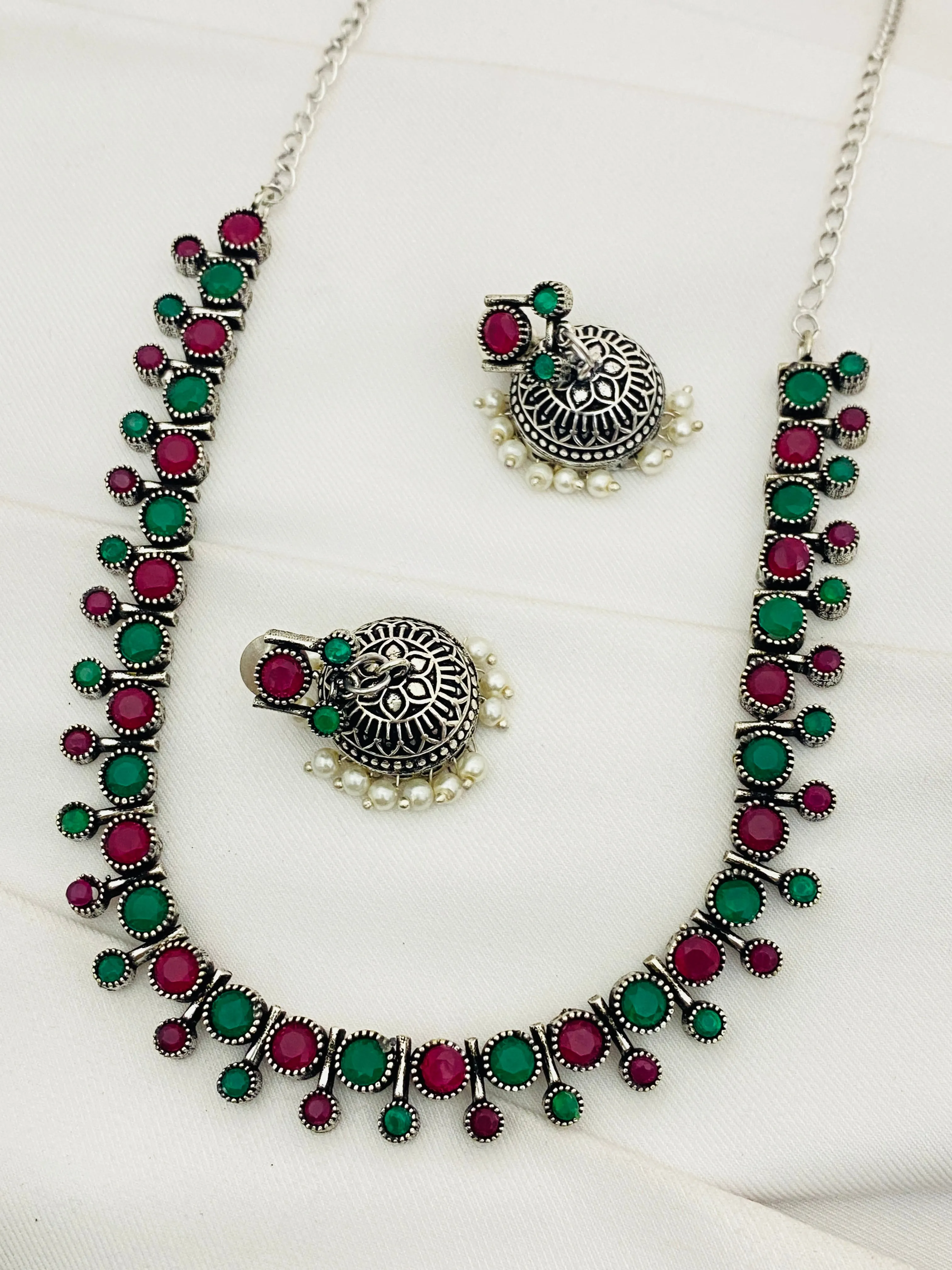 Stunning Emerald And Ruby Stoned German Silver Toned Oxidized Necklace Set With Jhumka Earrings